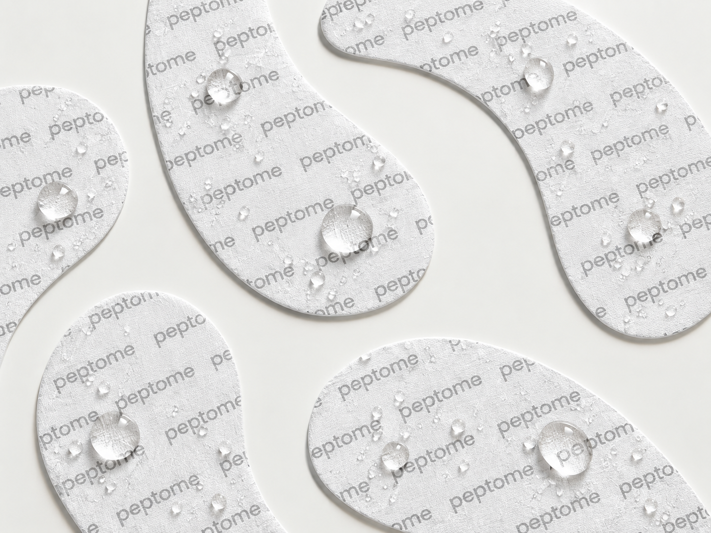 Peptome Copper Eye Patches pouch on a bedside table with coffee and a sleep mask